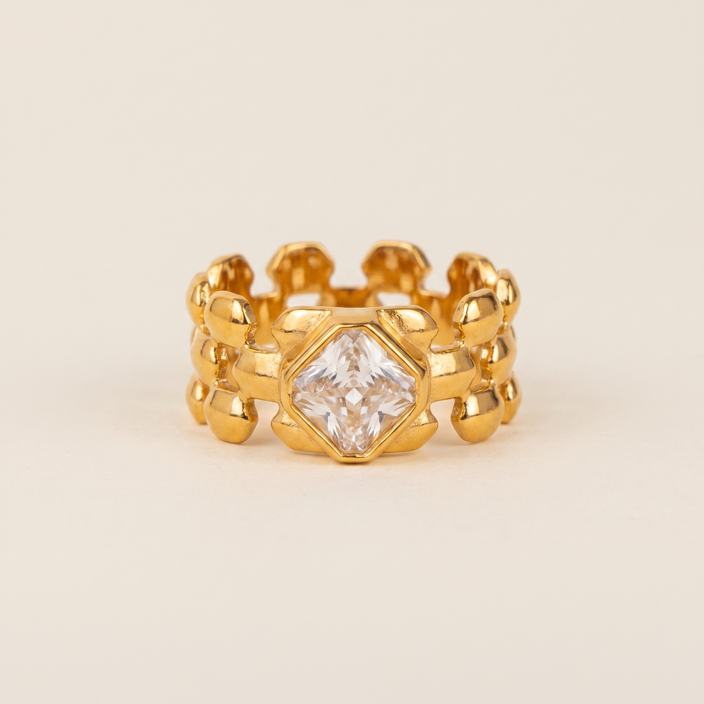 Anillo Reina dorado tipo cadena con circonitas
