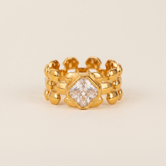 Anillo Reina dorado tipo cadena con circonitas