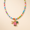 Collar Confetti Avión de mostacilla multicolor con charms de viaje