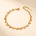 Pulsera Corazones de corazones dorados