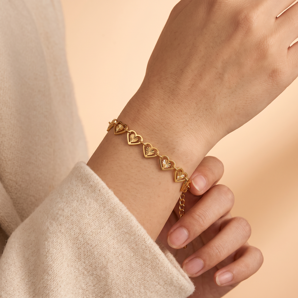 Pulsera Corazones de corazones dorados