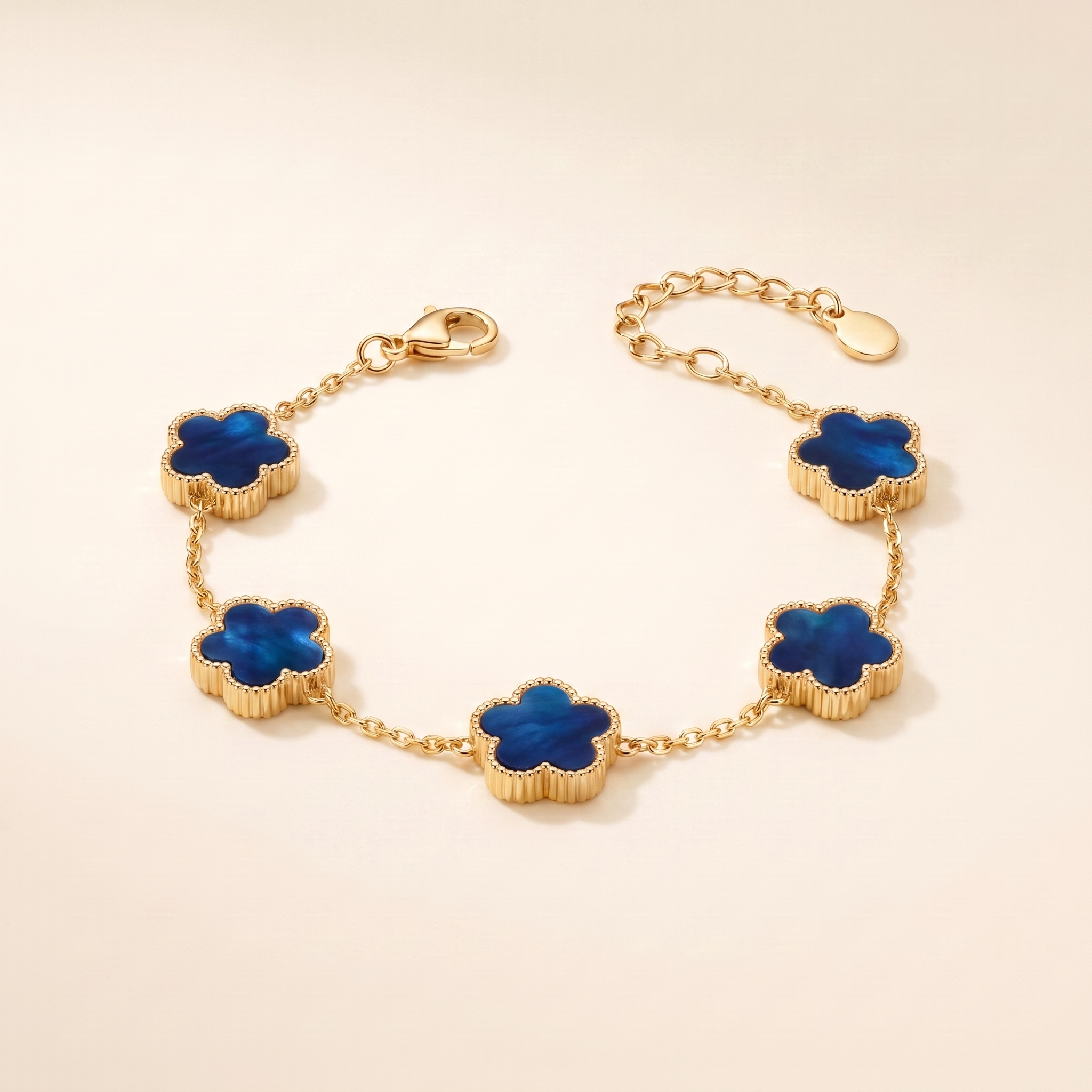 Pulsera Bloom Azul con flores azul nácar de borde dorado