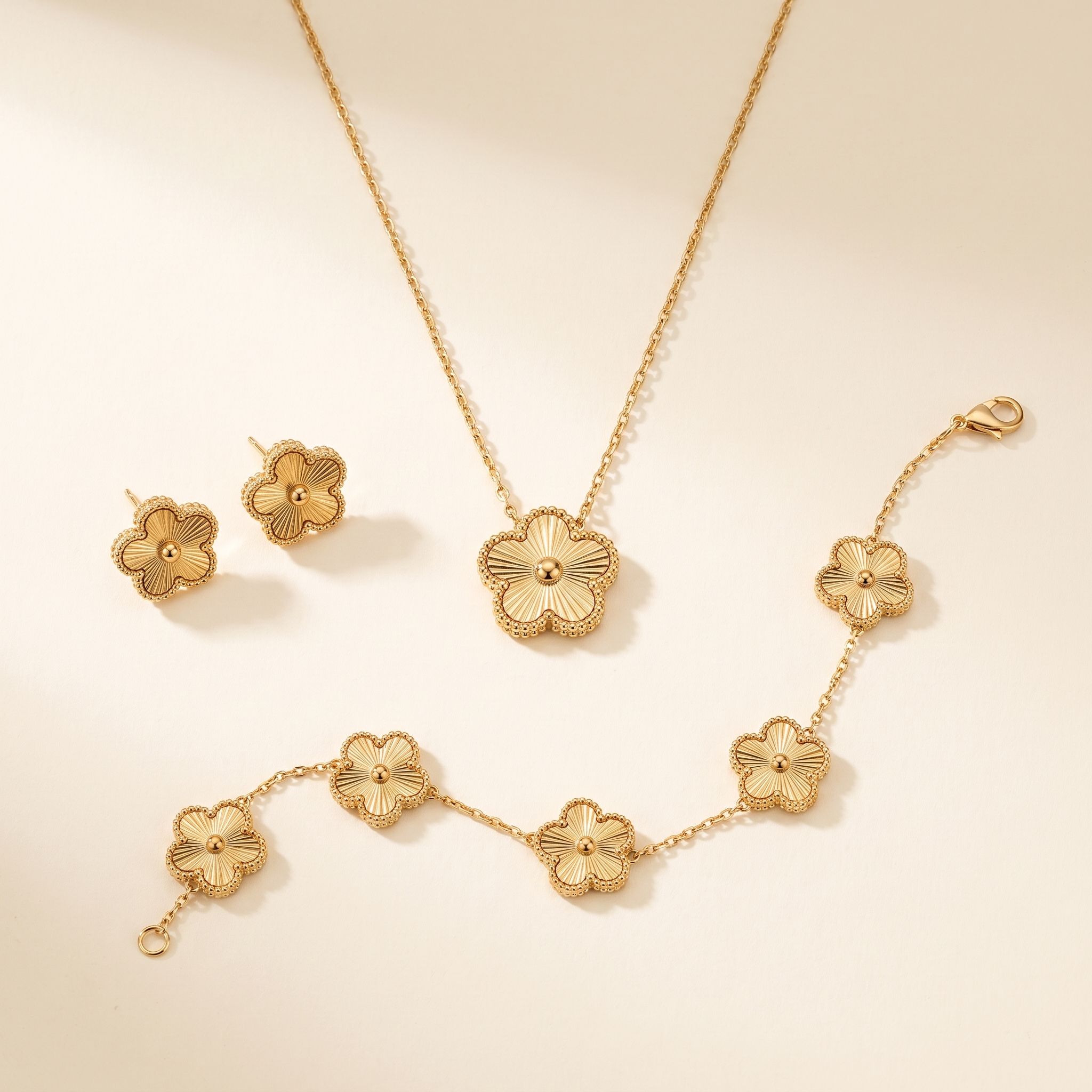 Set Bloom Dorado con collar, pulsera y pendientes de flores doradas
